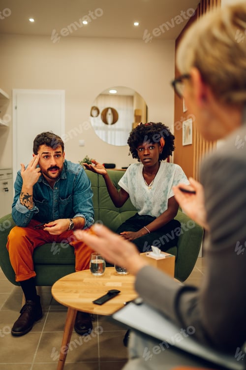 Preview: Diverse couple on a therapy session in a psychologist office
