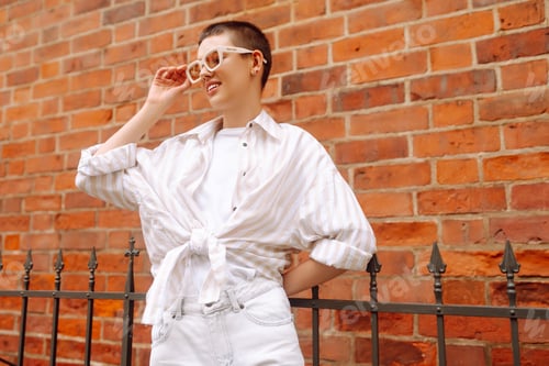 Preview: Cheerful tourist enjoys the urban vibe of the streets of Europe.