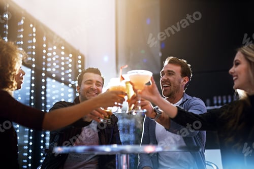 Preview: Cropped shot of a group of friends having drinks together at a party