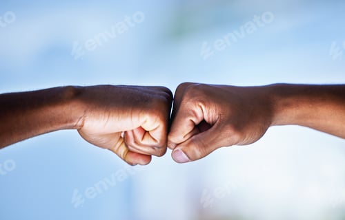 Preview: Teamwork makes us winners. Closeup shot of two unrecognisable men bumping fists.