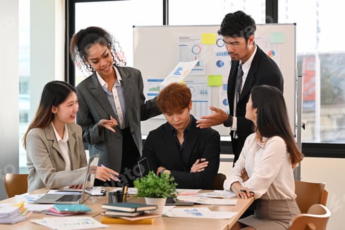 Preview: Group of businesspeople talking, brainstorming on start up project together at office meeting.