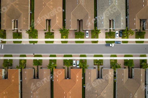 Preview: Aerial view of tightly located family houses in Florida closed suburban area.