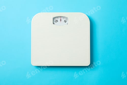 Preview: White weigh scales on blue background, top view