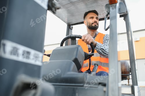Preview: Man working at warehouse and driving forklift