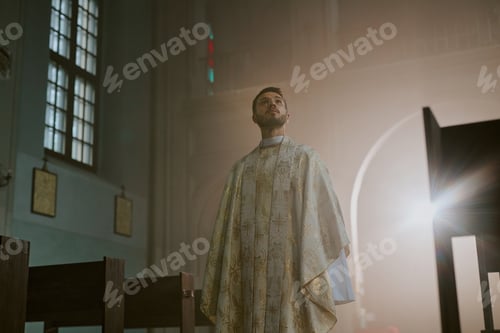 Preview: Priest in White Robe in Church