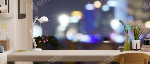 Preview: Copy space on wooden tabletop workspace over blurred city night lights view