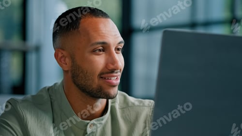 Preview: Closeup pensive thoughtful African Latina man manager writer journalist specialist entrepreneur