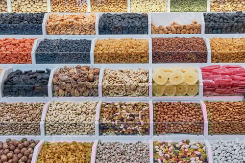 Preview: Counter with dried fruits and nuts at bazaar of resort town of Caucasus or Central Asia.
