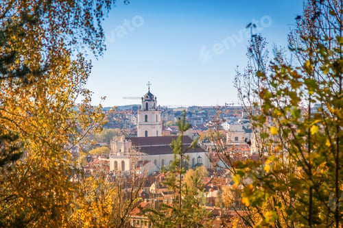 Preview: Cityscape of Vilnius old town in autumn with a view of the Saint Johns' Church bell tower