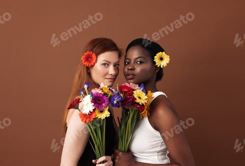 Preview: Two women of different races with flowers