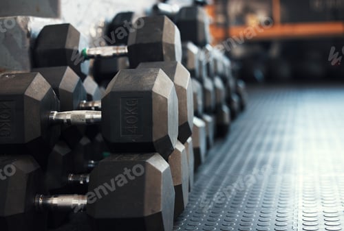 Preview: How heavy do you lift. Closeup shot of dumbbells in a gym.