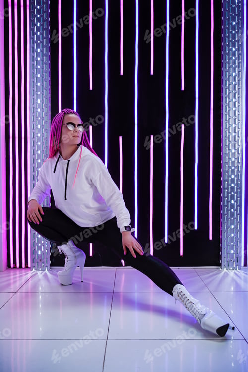Preview: A cinematic night portrait of a woman with sunglasses and neon lights