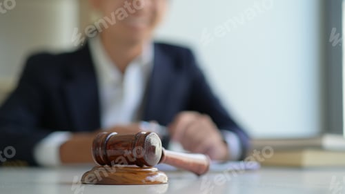 Preview: Concept of justice, Hammer and the lawyer are giving legal advice.