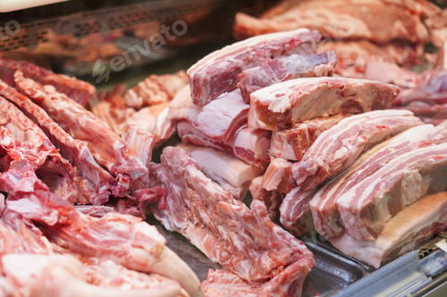 Preview: Butcher shop with meat packs. Different products in meat market. Meat counter