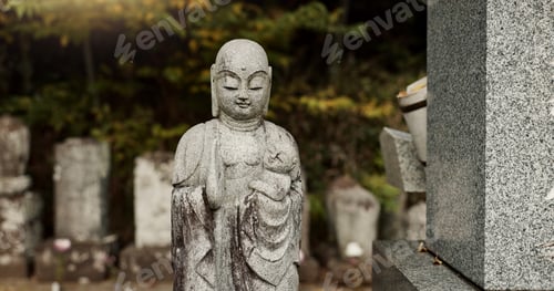 Preview: Buddha, statue in Japan graveyard with child for safety, protection and sculpture outdoor in nature