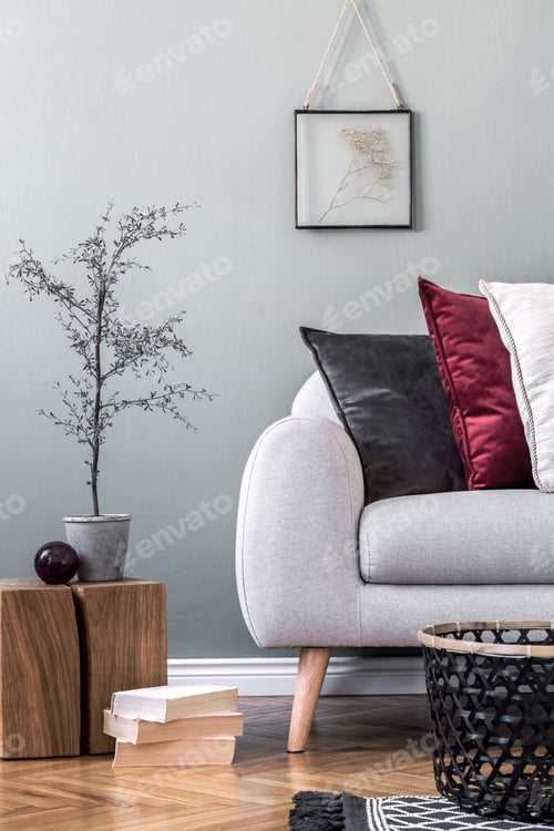 Preview: Stylish composition of cozy living room interior details and colorful classy pillows