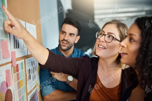 Preview: Shot of a group of colleagues having a brainstorming session in a modern office