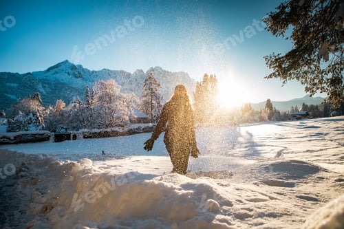 Preview: woman having fun in winter snow
