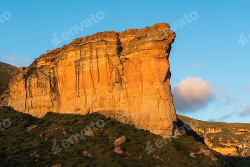 Preview: Brandwag (sentinel), a sandstone cliff during sunset at Golden Gate