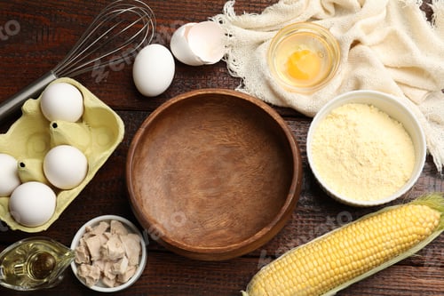 Preview: Making cornbread. Different ingredients and metal whisk on wooden table, flat lay