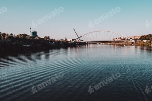Preview: Puente de Isabel II bridge over the river in Sevilla, Spain, Andalusia at sunset