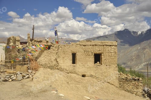 Preview: Side view of a abandoned ladakhi house with tibetan prayer flags in Padum, Zanskar Valley, Ladakh, I
