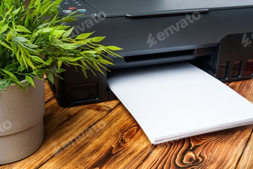Preview: Modern laser printer with paper on wooden background