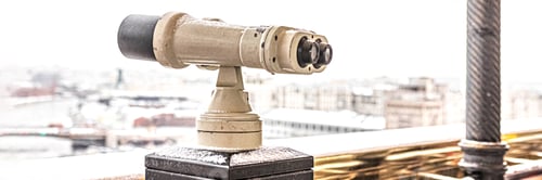 Preview: Coin-operated binoculars on the observation deck overlooking the city from above. Winter.Banner