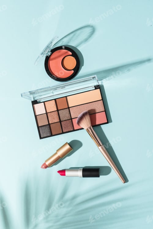 Preview: Make up products on blue background.