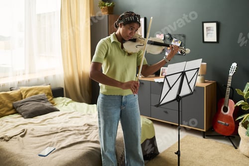 Preview: Playing Violin in Cozy Living Room with Modern Decor