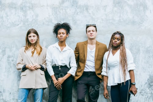 Preview: Diverse team portrait casual fashion confident expression urban wall