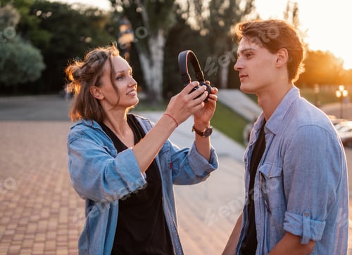 Preview: Lovely young hipster couple dating during summer sunset