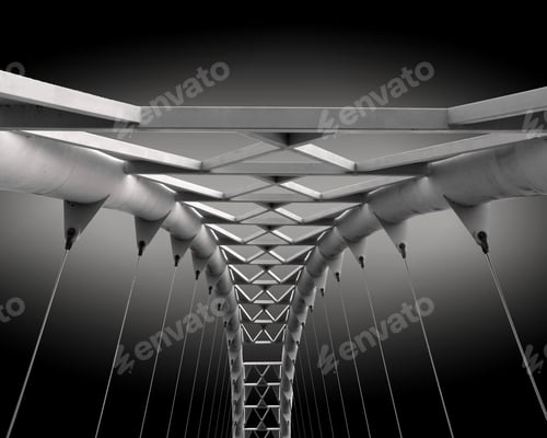 Preview: Gray scale closeup shot of a metal bridge with wires connected to it