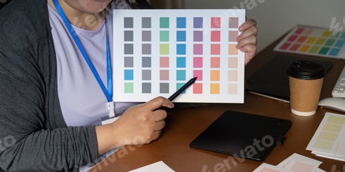 Preview: Graphic designer showcasing a vibrant color palette for creative projects