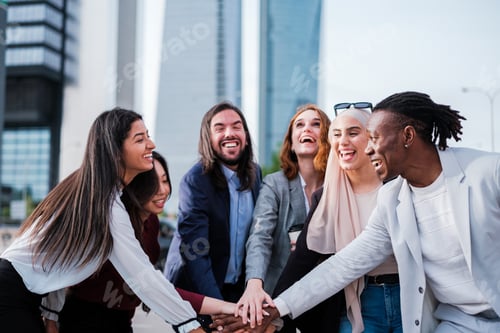 Preview: Group of businessmen putting their hands together determining their union in financial district