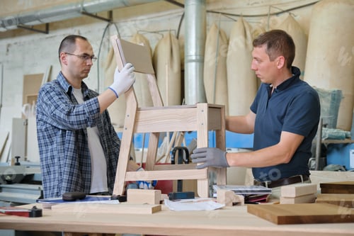 Preview: Joiners industrial workshop, two men working with wood