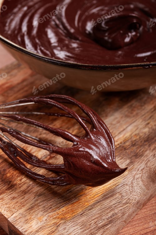 Preview: metal whisk, close-up with chocolate dough , baking, structure and consistency, homemade,