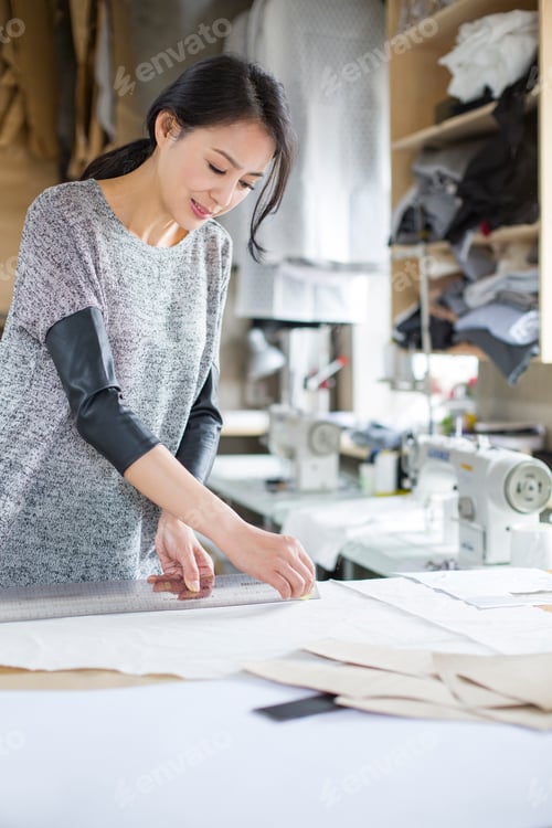 Preview: Fashion designer working in studio