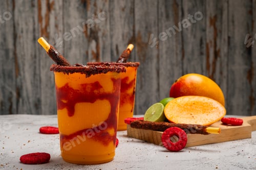 Preview: Mangonada, typical mexican mango smoothie with chamoy sauce and lime juice.