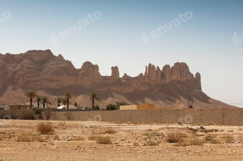 Preview: Desert Landscape with Rocky Mountains and Palm Trees