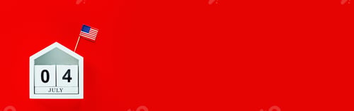 Preview: July 4th. Mockup of july 4 wooden color calendar on red background. Copy space for text