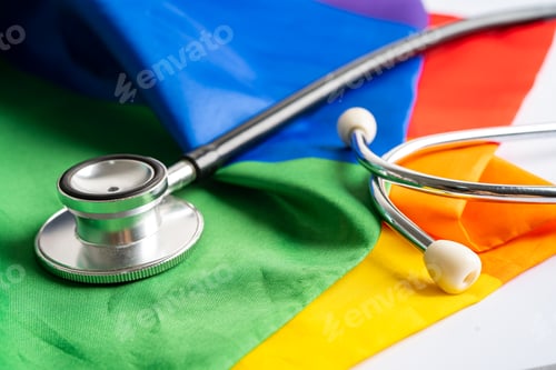 Preview: Black stethoscope on rainbow flag background, symbol of LGBT pride month celebrate annual in June