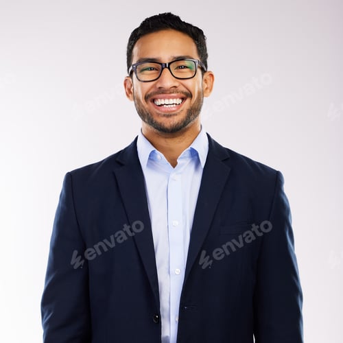 Preview: Studio shot of a handsome and happy young man posing against a grey background