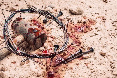 Preview: Good Friday, Passion of Jesus Christ. Crown of thorns, hammer, bloody nails on ground. Christian