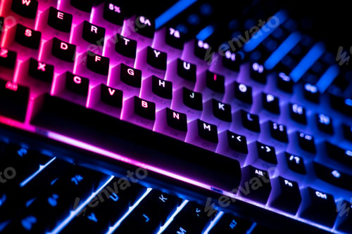 Preview: side view of two illuminated RGB keyboards in the dark