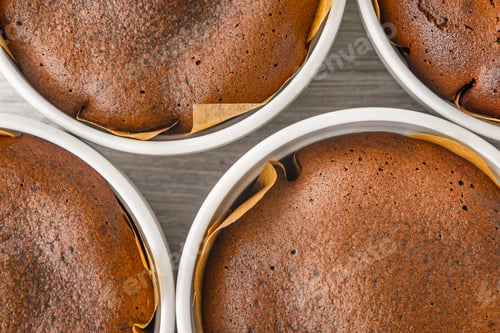 Preview: Chocolate fondant on the white wooden table close-up