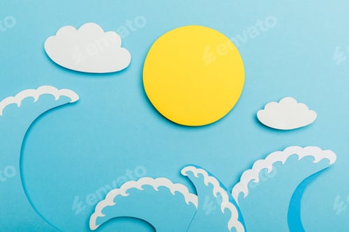 Preview: Top view of paper cut sun, clouds and sea waves on blue