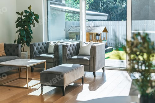 Preview: Cozy living room with elegant sofas and big window