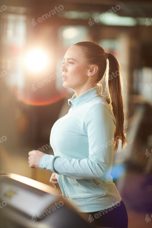 Preview: Young Woman on Treadmill