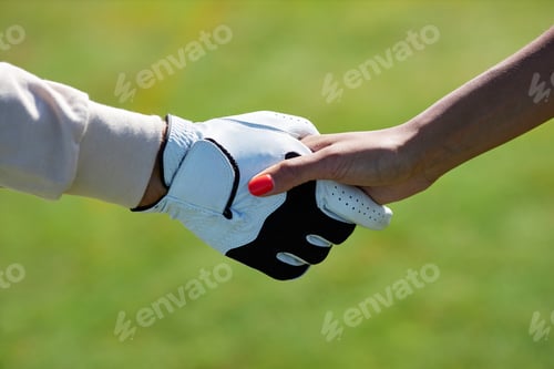 Preview: Closeup of two sports players shaking hands after game match